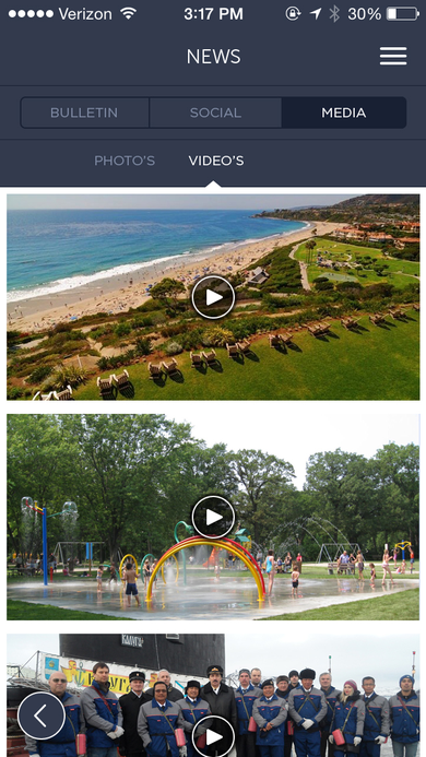 News screen on the Media tab showing a scrollable feed of video thumbnails from local parks and city events.