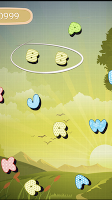 Alphabet mode gameplay with butterfly-shaped letters falling over a sunrise meadow and a matched pair circled.