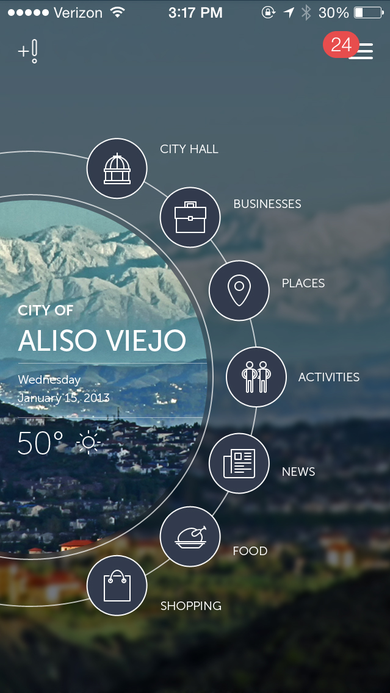 Circular dial home screen for the City of Aliso Viejo showing live weather, date, and radial icons for City Hall, Businesses, Places, Activities, News, Food, and Shopping.